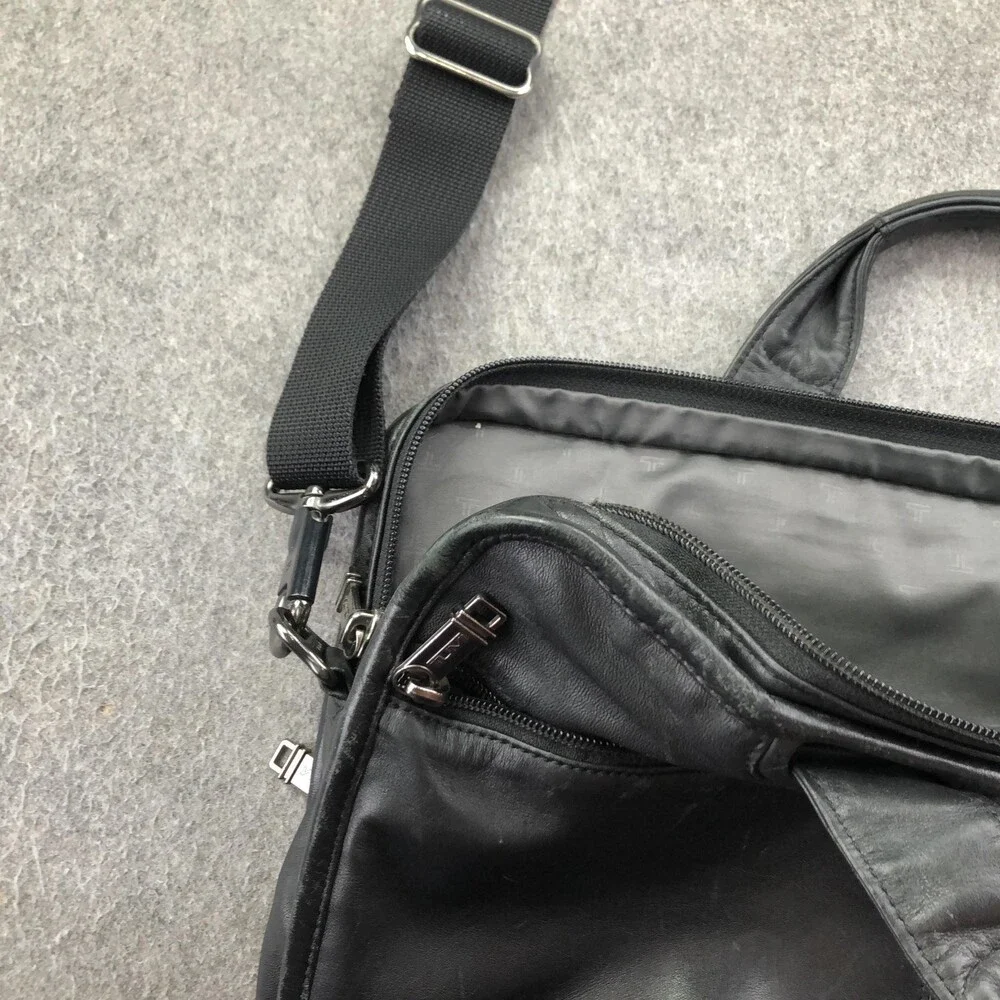 Tumi black leather